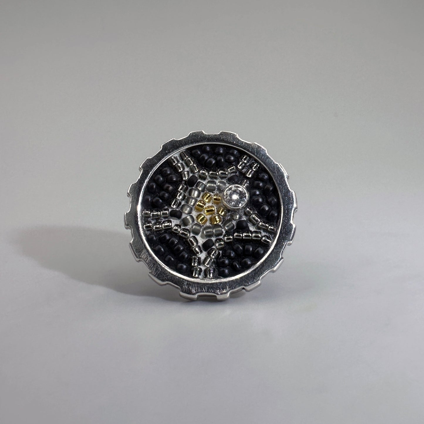 Sand in the Gears Brooches
